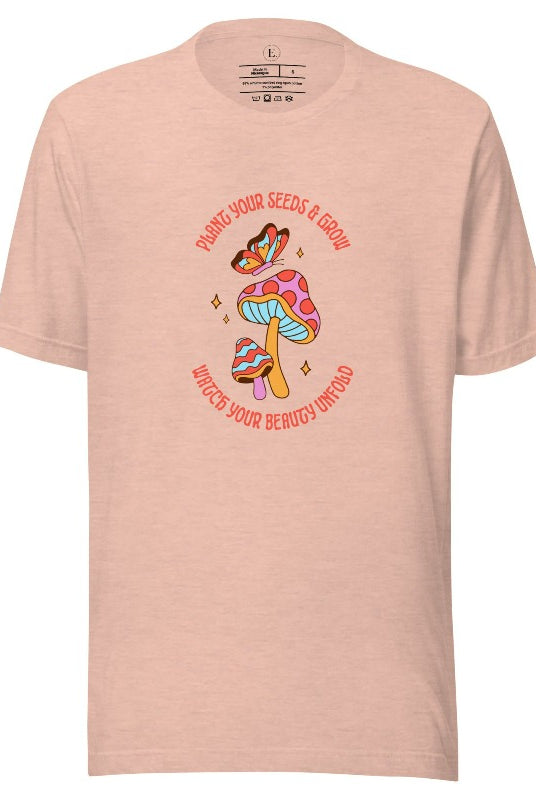 Embrace the beauty of nature with our mushroom and butterfly shirt. Featuring a captivating design of a mushroom and butterfly, it symbolizes growth and transformation. With the inspiring message "Plant your seed and grow watch your beauty unfold," on a heather prism peach shirt. 
