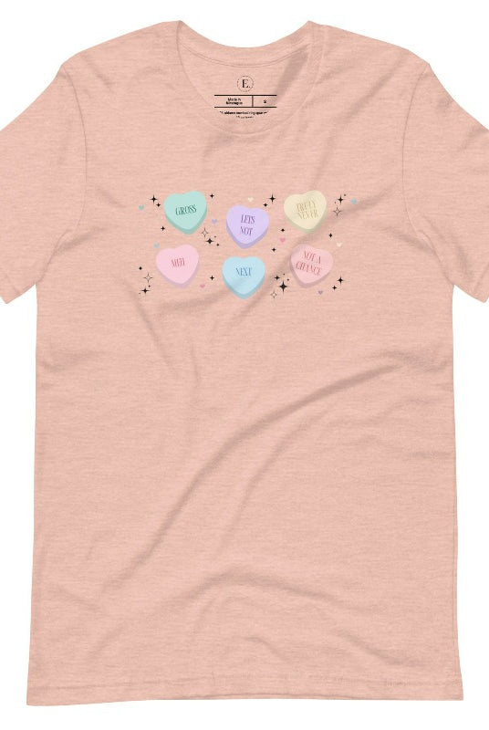 Embrace a humorous take on Valentine's Day with our shirt featuring candy hearts with unconventional messages like "Gross," "Not a Chance," "Next," "Truly Never," "Meh," "Not a Chance," and "Let's Not" on a heather prism peach shirt. 