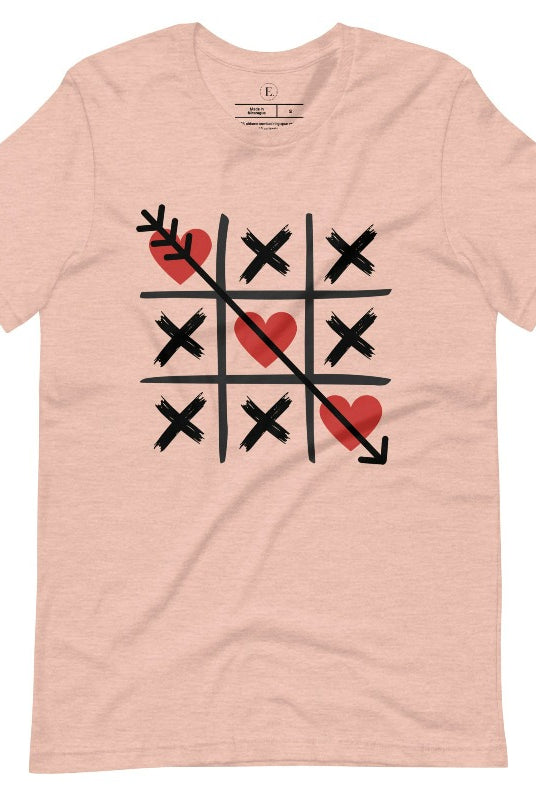 Add a playful twist to Valentine's Day with our Tic-Tac-Toe shirt featuring exes and three hearts. The winning move, an arrow through the three hearts, adds a cheeky touch to this fun and stylish heather prism peach shirt. 