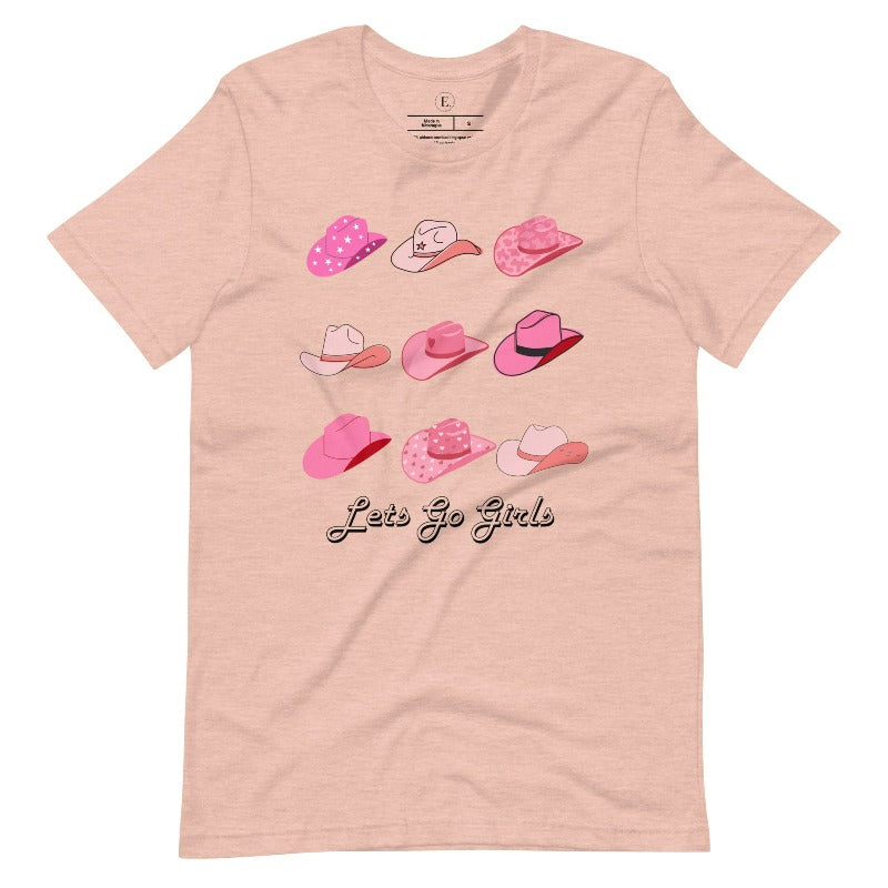 Get ready to wrangle in style with our country western shirt collection. Featuring a variety of pink cowboy hats and the classic phrase "Let's Go Girls," on a heather prism peach shirt. 