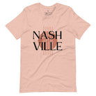 Capture the essence of Nashville with our minimalistic country western T-shirt. Featuring the iconic word "Nashville" with guitar strings silhouette, on a heather prism peach shirt. 