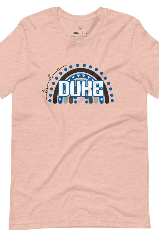 Celebrate diversity and show your support for Duke University with our eye-catching college t-shirt. Our shirt features the Duke colors on a captivating rainbow design, embodying the spirit of inclusion and unity with the iconic Duke wordmark atop the rainbow on a heather prism peach shirt. 