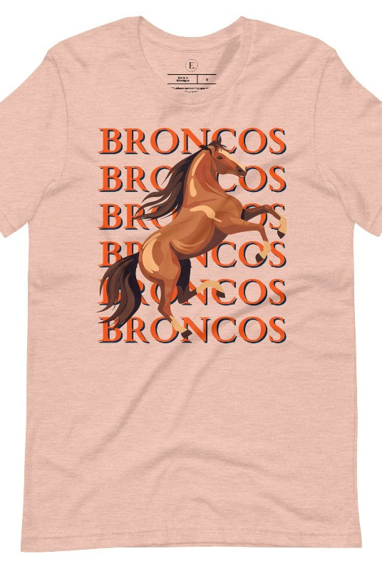 Saddle up for game day fun with our Bella Canvas 3001 unisex graphic tee! Gallop into Broncos spirit with our exclusive design featuring a lively Bronco horse and the spirited mantra "Broncos Broncos Broncos Broncos" on a heather prism peach shirt. 