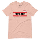 Introducing our England Rugby Graphic T-Shirt - made for rugby fans who want to show off their pride in a stylish and contemporary way! Featuring the words "England Rugby" and the iconic England flag, on a peach shirt.