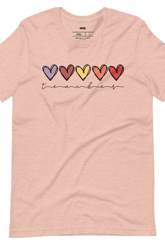 Modern heart design on a peach graphic tee with the word 'teacher' - perfect for teacher shirts and teacher gifts. Peach graphic tees.