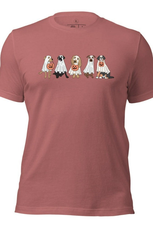 5 dogs dressed as ghost getting ready to trick or treat on a mauve colored t-shirt.