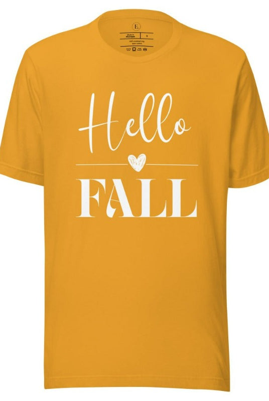 Hello Fall with heart between Hello and Fall graphic tee on a mustard colored shirt.