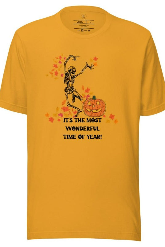 Dancing Skeleton in fall leaves with a jack-o-lantern with saying "It's the most wonderful time of year" on a mustard colored shirt.