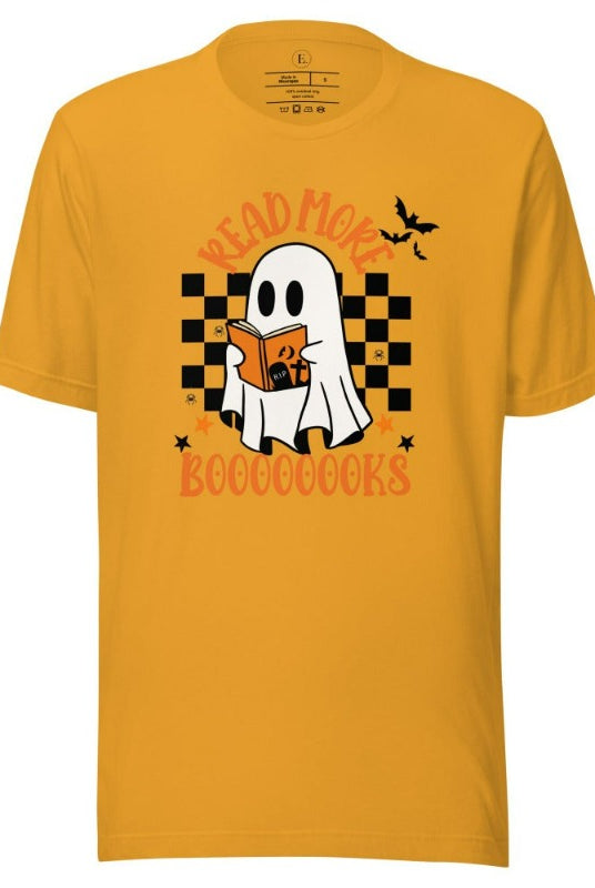 Read More Booooks is a ghost reading a book in front of a checkered background on a mustard colored shirt. 