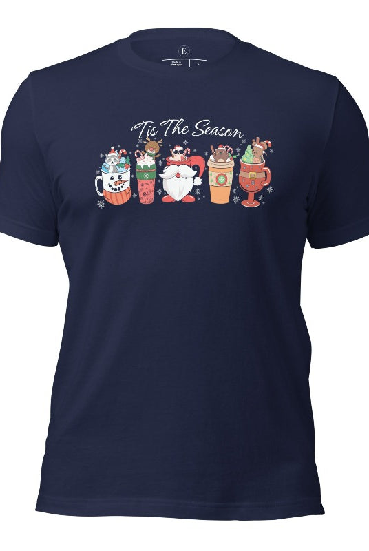 Wrap yourself in cozy holiday vibes with our Christmas coffee cup shirt. With a festive design that says "Tis The Season," this shirt captures the essence of warmth and joy on this navy colored shirt. 