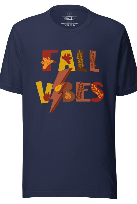 Get into the autumn spirit with our Fall Vibes shirt. Featuring the words 'Fall Vibes' with a creative twist- a lighting bolt replacing the 'I'- this shirt captures the energy of the season. Adorned with leaves, it adds a touch of nature's beauty on a navy shirt. 
