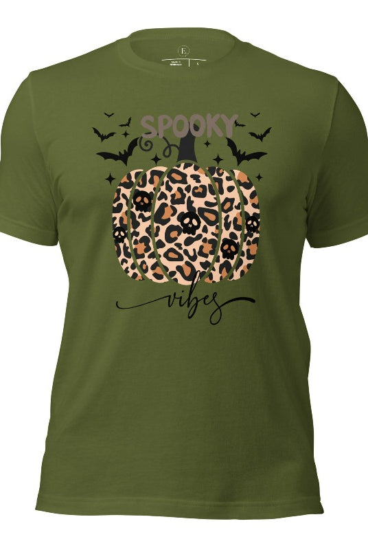 Get into Halloween spirit with our spooky vibes shirt featuring a unique cheetah print pumpkin adorned with skulls. As bats soar across the starry sky, embrace the eerie charm of this one-of-a-kind design on an olive colored shirt. 