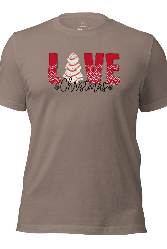 Spread love and joy this holiday season with our Christmas shirt featuring the classic Christmas tree cake, which is incorporated into the word "Love" on a pebble colored shirt.