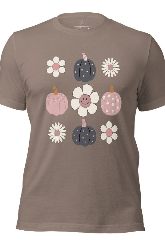 Step into retro autumn vibes with our trendy t-shirt. Featuring a delightful combination of pumpkins and retro flowers, on a pebble colored shirt. 