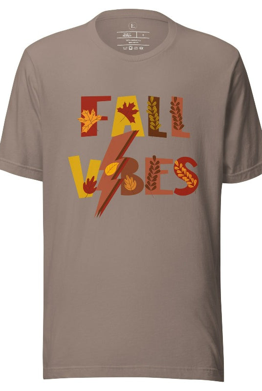 Get into the autumn spirit with our Fall Vibes shirt. Featuring the words 'Fall Vibes' with a creative twist- a lighting bolt replacing the 'I'- this shirt captures the energy of the season. Adorned with leaves, it adds a touch of nature's beauty on a pebble shirt. 