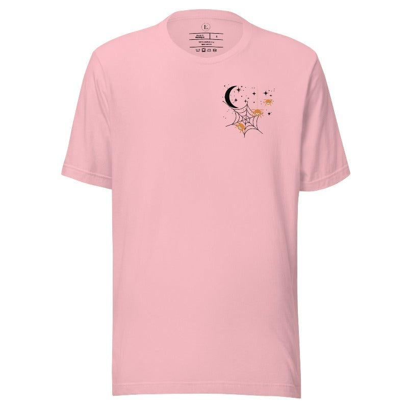 Embrace the enchanting night sky with our captivating t-shirt. Featuring a crescent moon, stars, and a spiderweb with three adorable spiders hanging down on the front pocket on a pink shirt. 