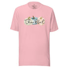 Express gratitude in style with our charming t-shirt. This design radiates autumn appreciation, featuring three pastel pumpkins and the word 'thankful' gracefully woven through the middle on a pink shirt. 