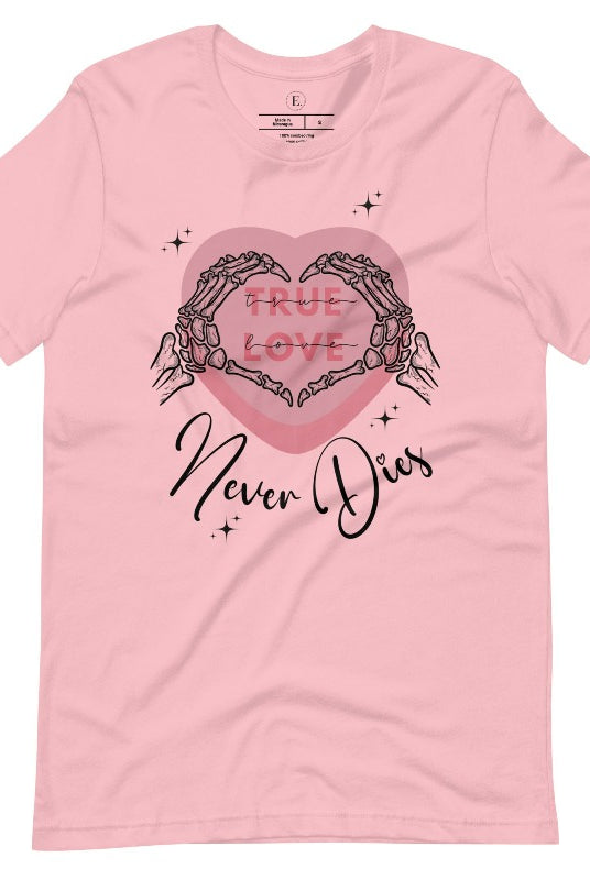 Embrace the unconventional with our Valentine's Day shirt featuring the bold statement "True Love, Never Dies" adorned with a heart and skeleton hands forming a heart shape on a pink shirt. 