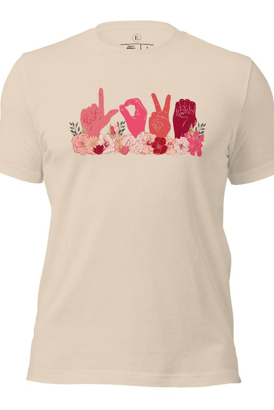 ASL hands signing love in floral flowers on a soft cream colored shirt.