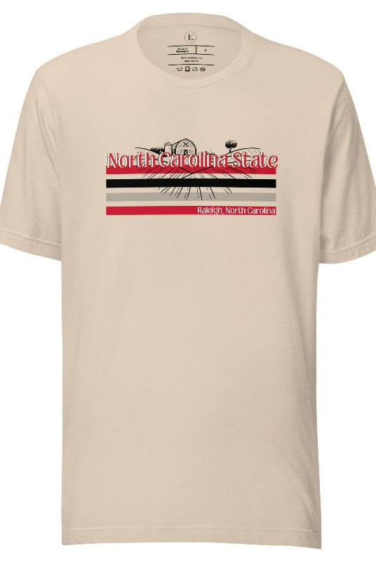 NC State retro-inspired shirt paying homeage to the schools rich history and renowned agricultural programs. Design on a soft cream colored shirt.