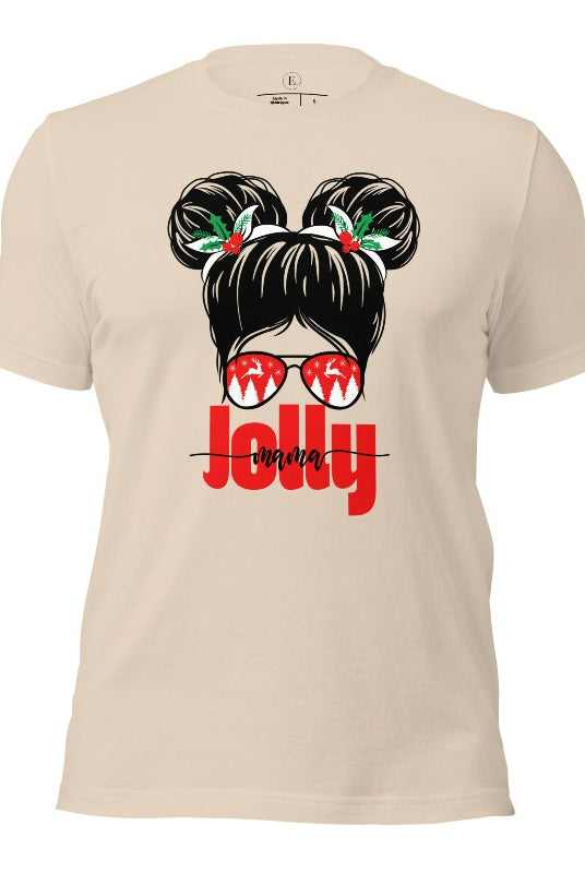 Get into the holiday spirit with our "Jolly Mama" Christmas Shirt! Featuring a stylish mom rocking pigtail buns and festive Christmas Sunglasses on a soft cream colored shirt.