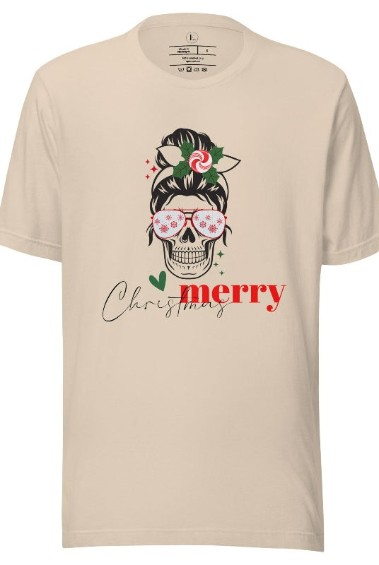 Get into the festive spirit with our Merry Christmas messy bun skull shirt design on a soft cream colored shirt.