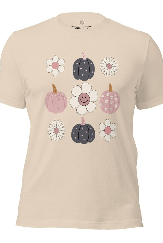 Step into retro autumn vibes with our trendy t-shirt. Featuring a delightful combination of pumpkins and retro flowers, on a soft cream shirt. 