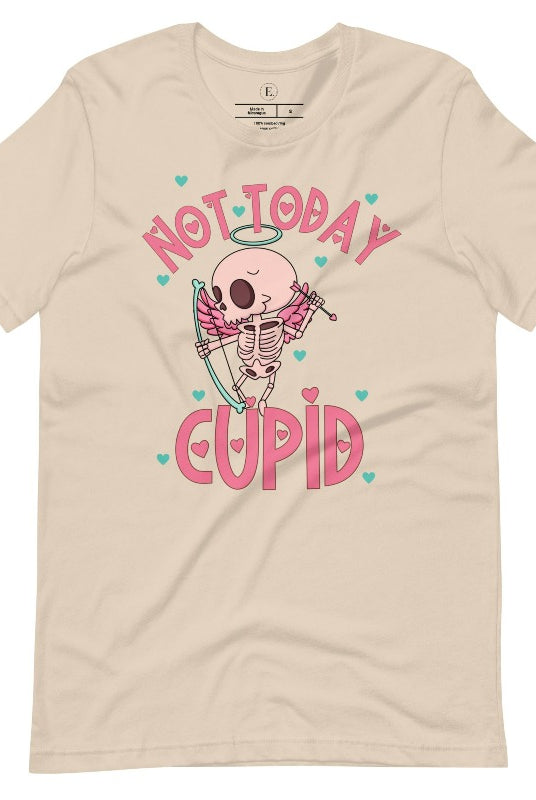 Unleash your rebellious spirit this Valentine's Day with our edgy shirt featuring a skeleton Cupid. The bold "Not Today Cupid" message adds a touch of attitude, making this tee a standout choice for those who march to the beat of their own drum on a soft cream shirt. 
