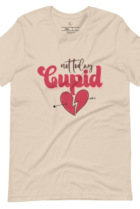 Spice up your Valentine's Day with our edgy shirt featuring a broken heart pierced by an arrow, and the defiant phrase "Not Today Cupid" on a soft cream shirt. 