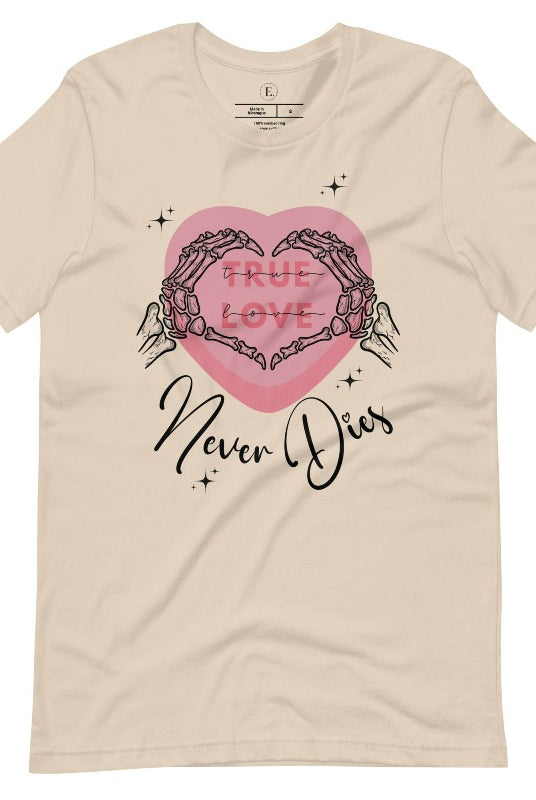 Embrace the unconventional with our Valentine's Day shirt featuring the bold statement "True Love, Never Dies" adorned with a heart and skeleton hands forming a heart shape on a soft cream shrit. 