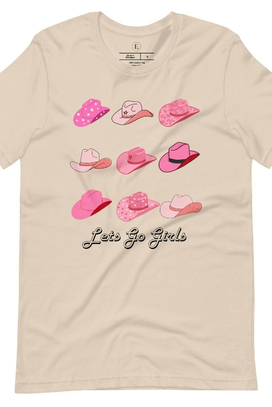 Get ready to wrangle in style with our country western shirt collection. Featuring a variety of pink cowboy hats and the classic phrase "Let's Go Girls," on a soft cream shirt. 