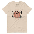 Capture the essence of Nashville with our minimalistic country western T-shirt. Featuring the iconic word "Nashville" with guitar strings silhouette, on a soft cream shirt. 