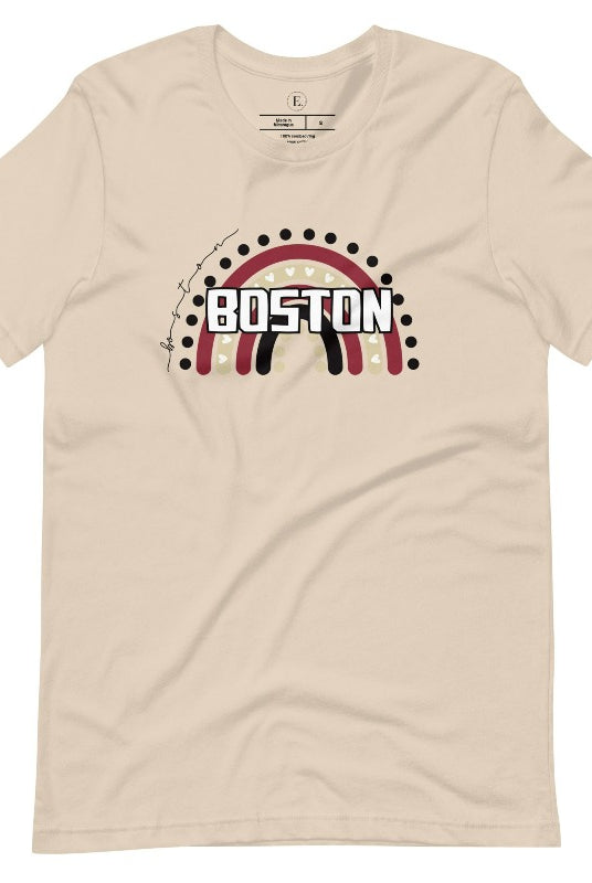 Show off your pride with this Boston College t-shirt. The iconic BC school colors stands out in this modern and trendy rainbow background, representing the school spirit. With the classic Boston wordmark across the rainbow on a soft cream shirt. 