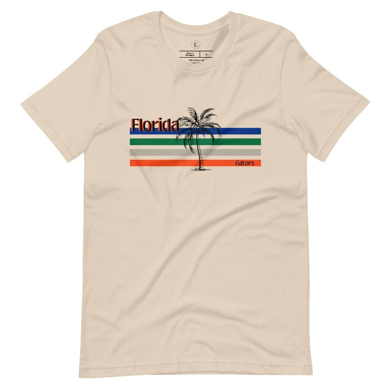 Celebrate your love for the Florida Gators with our modern-inspired retro t-shirt. It captures the essence of campus life, featuring school colors in lines and a palm tree motif on a soft cream shirt. 