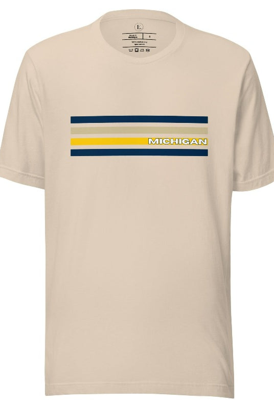 Revive retro collegiate fashion with our Michigan graphic tee. Bosting classic school colors and minimalist design, this men's shirt features distinctive chest stripes with "Michigan" in bold block lettering on a soft cream shirt. 