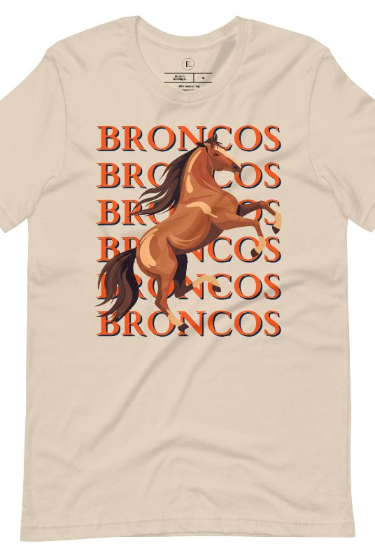 Saddle up for game day fun with our Bella Canvas 3001 unisex graphic tee! Gallop into Broncos spirit with our exclusive design featuring a lively Bronco horse and the spirited mantra "Broncos Broncos Broncos Broncos" on a soft cream shirt. 