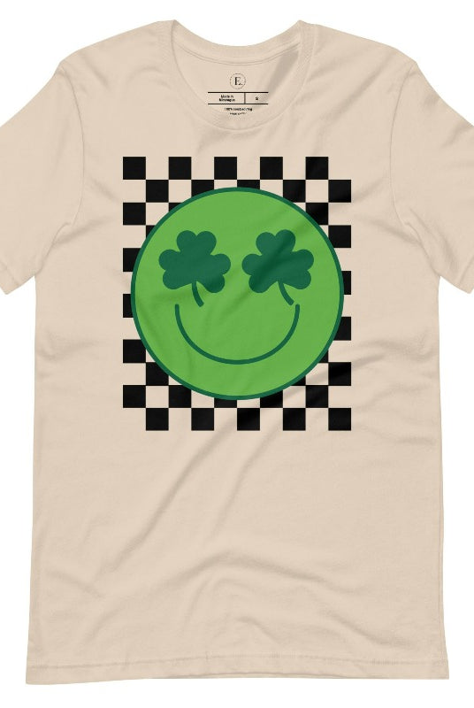 Get in the Saint Patrick's Day spirit with our Bella Canvas 3001 unisex graphic t-shirt! This unique design features a retro green smiley face with shamrock eyes, perfect for those seeking a festive and nostalgic look on a soft cream colored shirt.