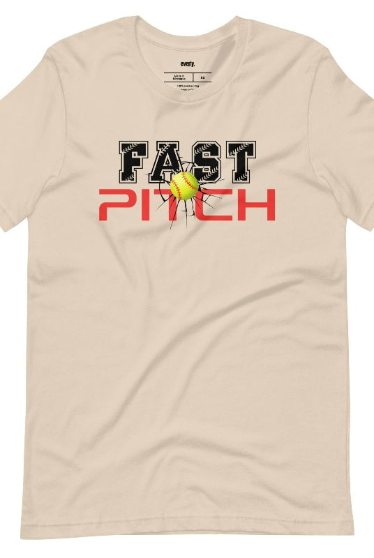 Fast pitch softball graphic tee on a soft cream shirt.