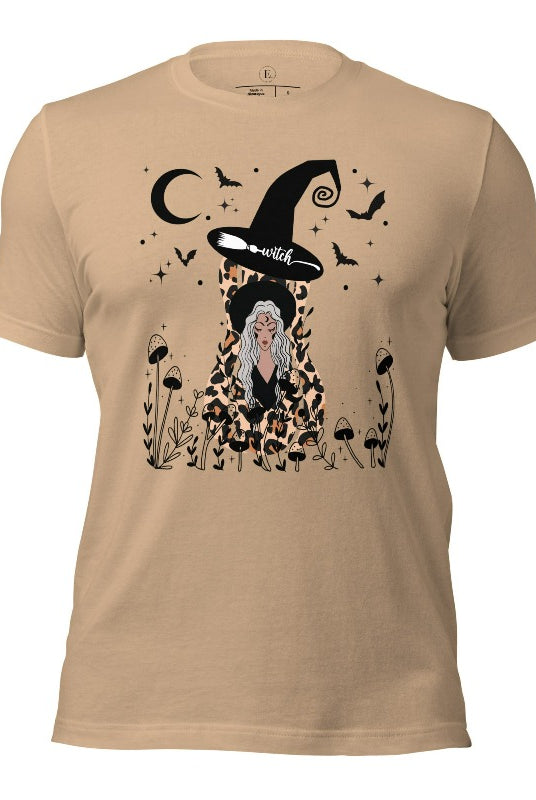 Elevate your Halloween style with our striking shirt featuring a cheetah print squash and a stylish lady donning a witch hat adorned with flowers and bats. Embrace the enchanting fusion of nature and magic on a tan shirt. 