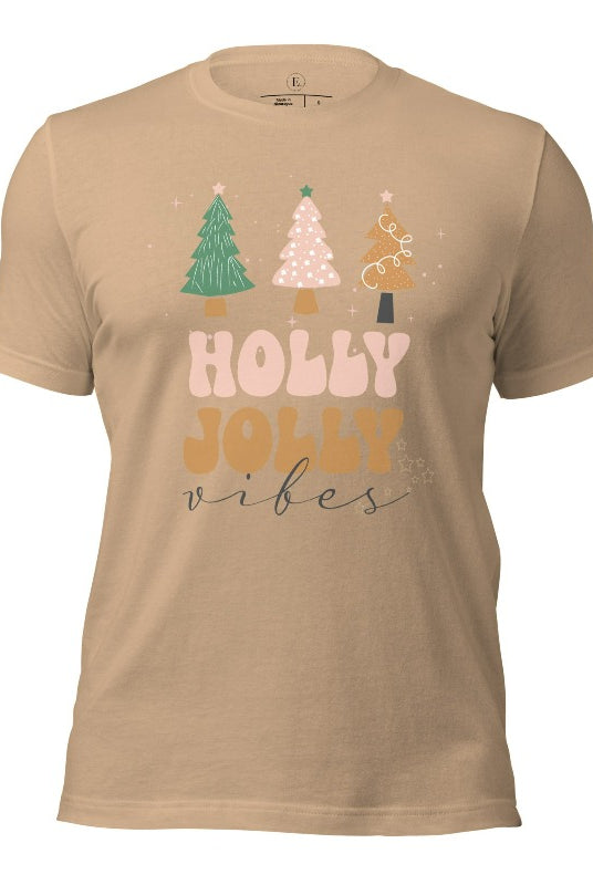 Get ready to feel the holly jolly vibes with our Christmas shirt! This festive shirt features a playful message that reads "Holly Jolly Vibes" and is adorned with cheerful Christmas trees, radiating the holiday cheer on a tan shirt.