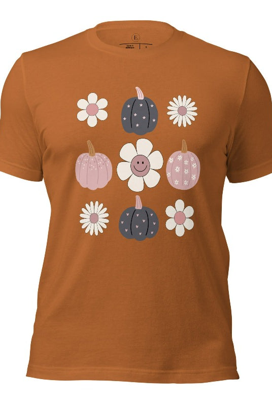 Step into retro autumn vibes with our trendy t-shirt. Featuring a delightful combination of pumpkins and retro flowers, on a toast colored shirt. 