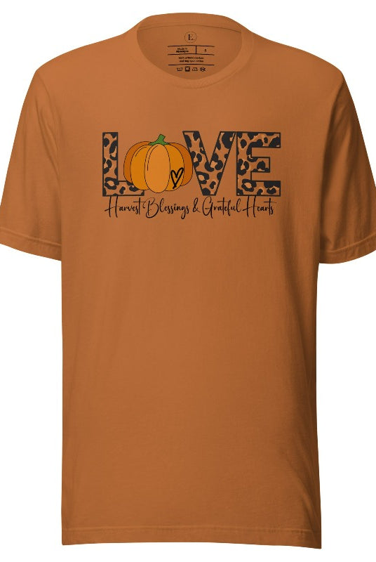 Spread love and autumn vibes with our trendy t-shirt. Featuring the word 'love' in cheetah print with a pumpkin as the 'o,' and "Harvest Blessings and Grateful Hearts' underneath on a toast colored shirt. 