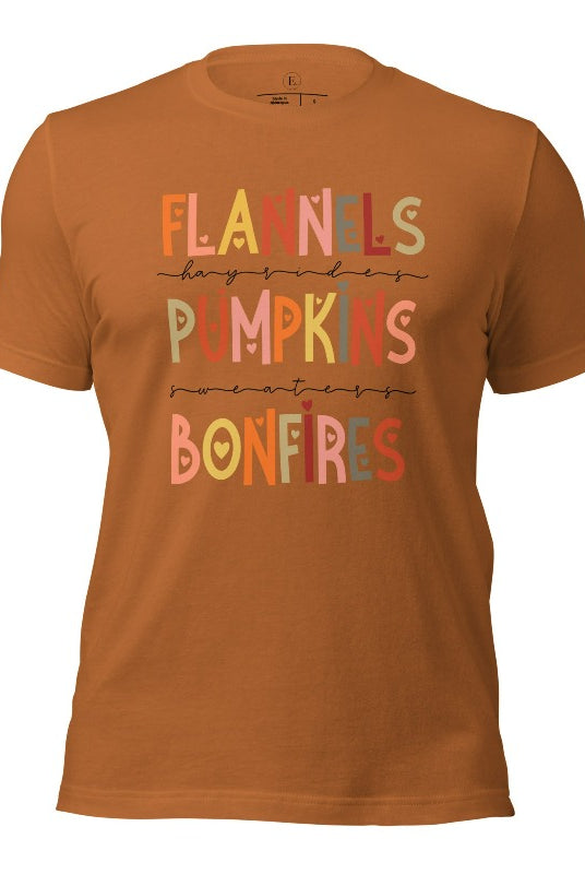 Embrace the cozy spirit of fall with our Flannel, Hayrides, Pumpkins, Sweaters, Bonfires shirt. Featuring the iconic fall elements, this shirt celebrates the season of warmth and comfort on a toast colored shirt. 