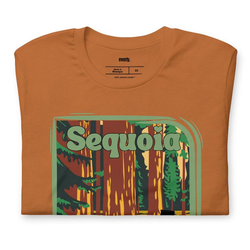 a vibrant illustration of Sequoia National Park, showcasing towering sequoia trees with a vintage-inspired design on a toast shirt.