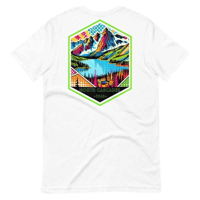 a vibrant, retro-style design of North Cascades National Park on the back, and "North Cascades National Park | Washington - 1968" text on the front on a white shirt.