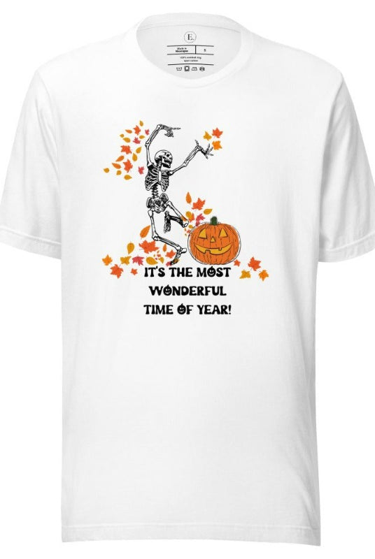 Dancing Skeleton in fall leaves with a jack-o-lantern with saying "It's the most wonderful time of year" on a white shirt.