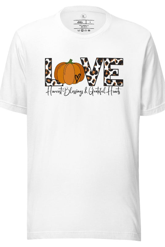 Spread love and autumn vibes with our trendy t-shirt. Featuring the word 'love' in cheetah print with a pumpkin as the 'o,' and "Harvest Blessings and Grateful Hearts' underneath on a white shirt. 