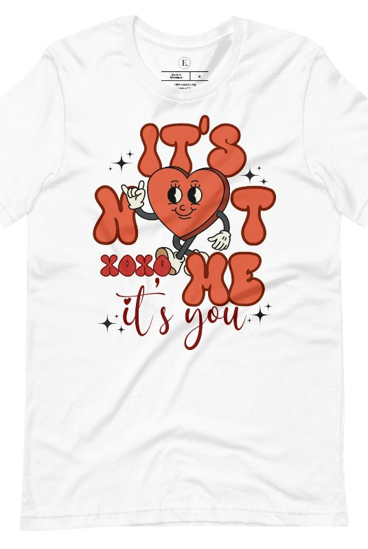 Celebrate Valentine's with our playful shirt! Featuring a bold heart and the message "It's not me, it's you," on a white shirt. 