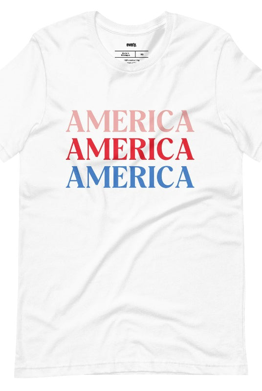 Close-up image of a USA July 4th graphic tee with the word 'America' repeated three times in bold lettering on the front. This festive tee is perfect for celebrating Independence Day in style and showing off your patriotic spirit on a white graphic tee.
