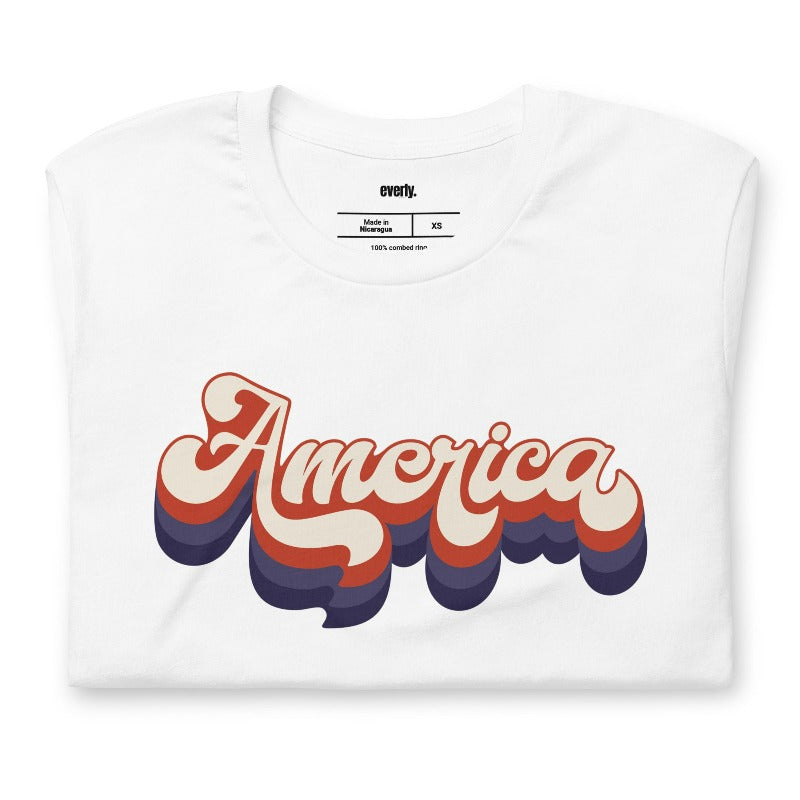 America in retro lettering PNG sublimation digital download design, on a white graphic tee.